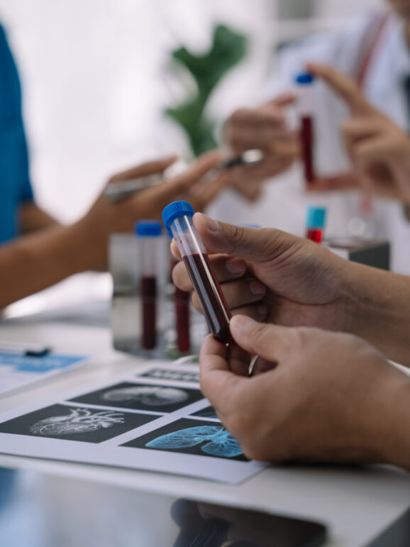 Medical team working on digital tablet healthcare doctor technology tablet using computer analyzed the results of medical reports at the hospital.
